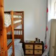 il y a deux deux chambre avec un lit superpos&eacute;
